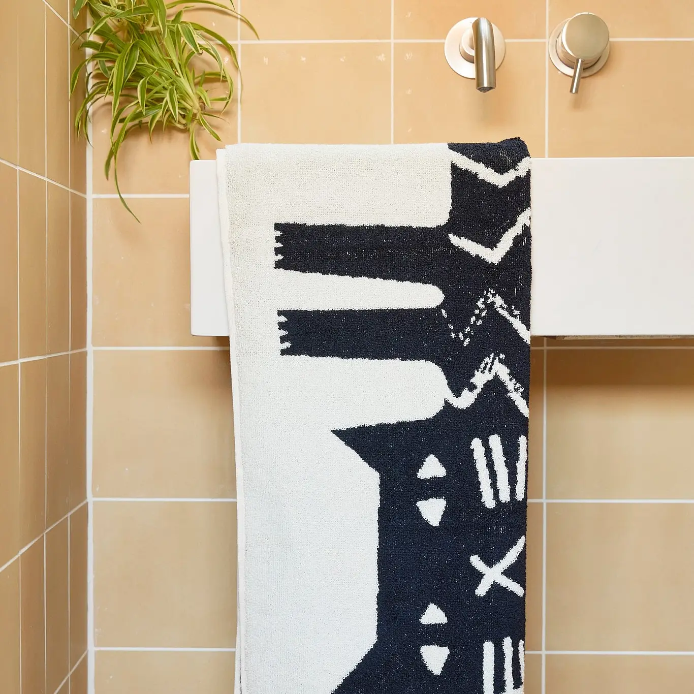 Lazy Cat Hand Towel by Donna Wilson - Image 2